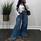 Högmidjade oversized jeans med vida ben för damer