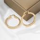 Eleganta tvinnade hoop-örhängen för damer – Slimmade & lätta – Guldpläterade, tidlös design – perfekta för vardag eller fest – smidiga att bära hela dagen 💛