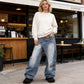 Damjeans med asymmetrisk midja och vida ben