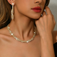 Set med halsband och örhängen med glittrande strass och klorformad kedja för kvinnor
