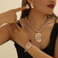 Elegant smyckesset med strass, 4 delar