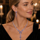 Elegant set med halsband och örhängen med fjärilsmotiv