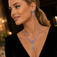 Elegant set med halsband och örhängen med fjärilsmotiv