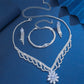 Elegant smyckeset med lotusmotiv och strass