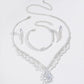 Elegant smyckeset med lotusmotiv och strass