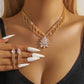 Elegant smyckeset med lotusmotiv och strass